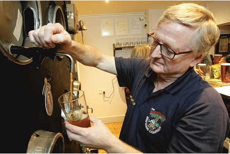 Pouring a beer at the Micropub